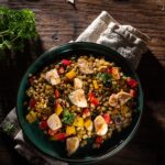 Warm salad with lentils, chicken breast, and vegetables